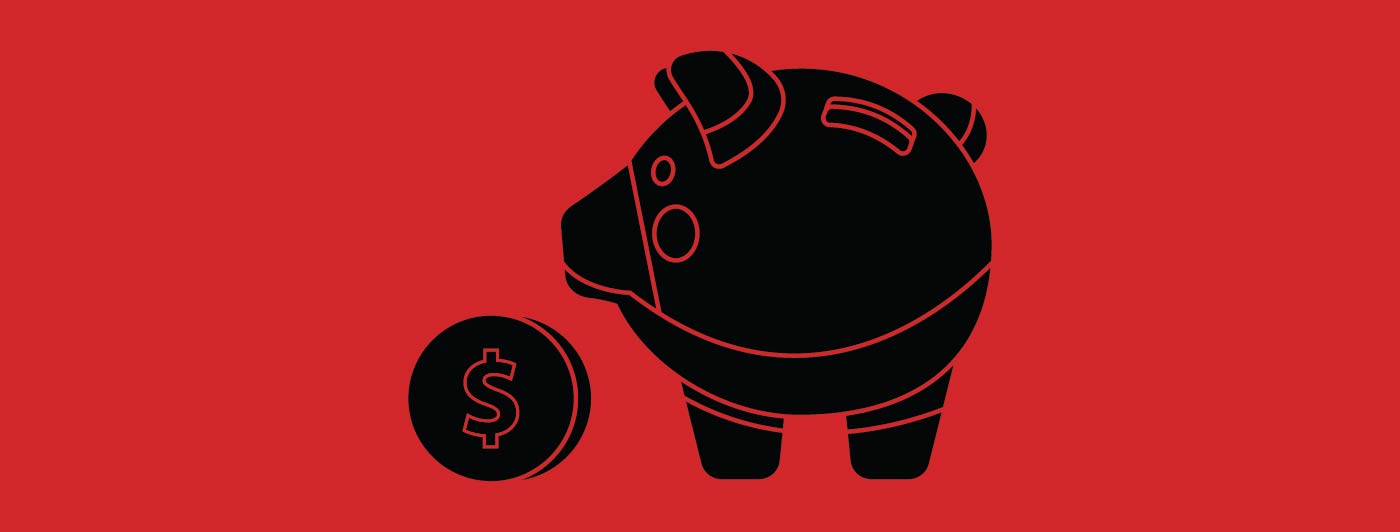 a coin next to a pig shaped piggy bank